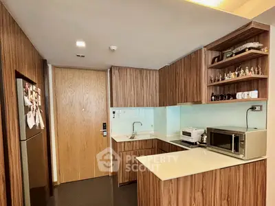 Modern kitchen with wooden cabinets and sleek appliances