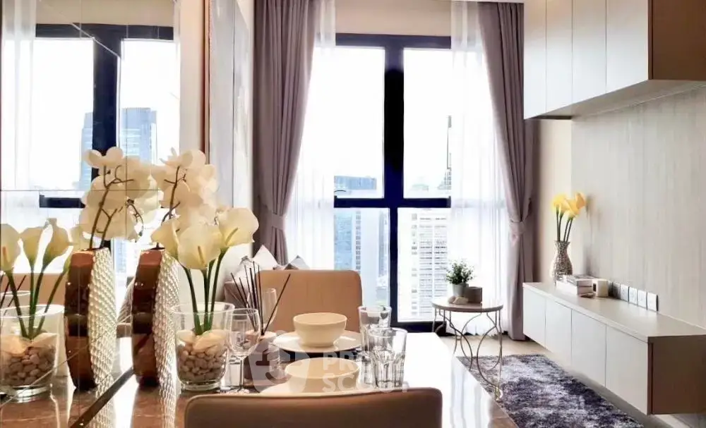 Modern living room with city view, elegant decor, and natural light.
