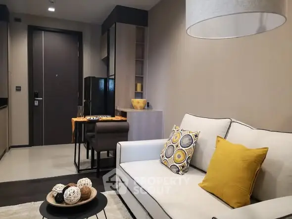 Modern living room with stylish decor and cozy seating area.