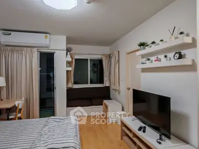 Cozy bedroom with modern decor and natural light