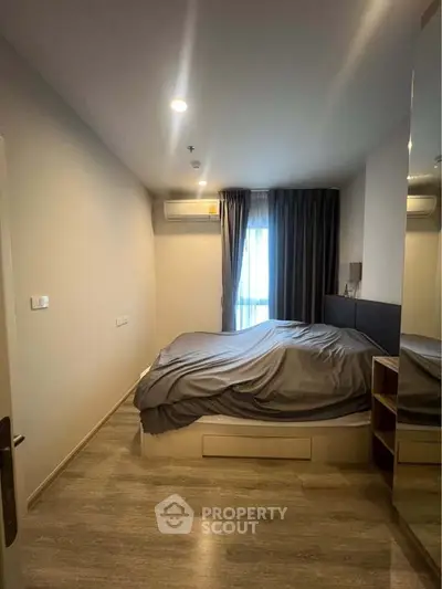 Cozy modern bedroom with sleek design and natural light