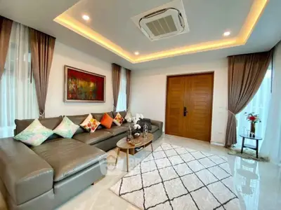 Luxurious modern living room with elegant decor and spacious seating area