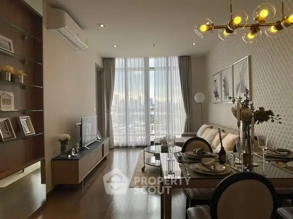 Luxurious living room with elegant decor and city view, featuring modern furniture and ambient lighting.