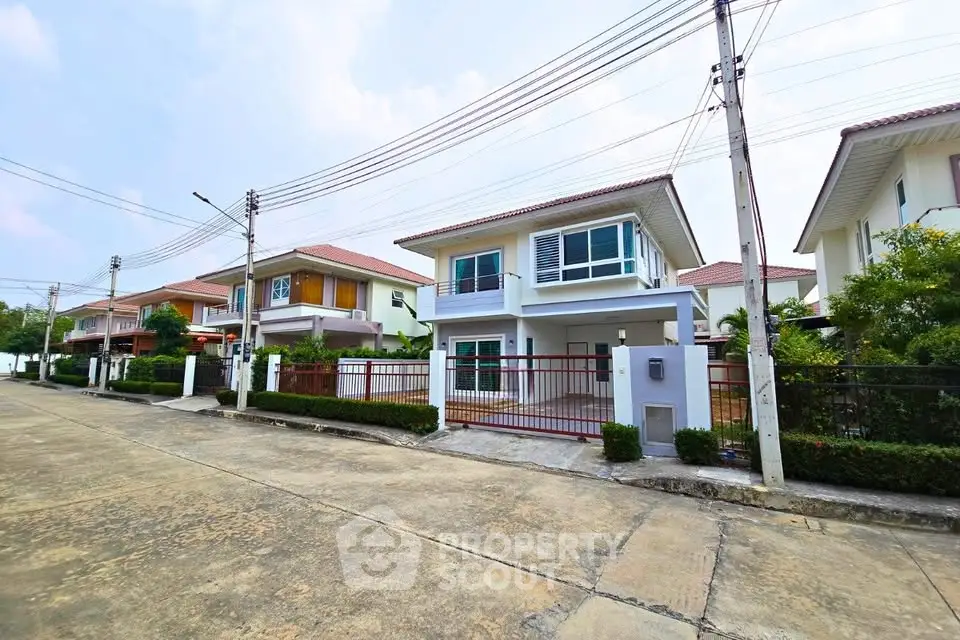 Charming suburban house with modern design and spacious driveway in a peaceful neighborhood.