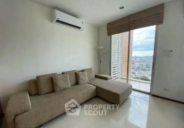 Modern living room with city view and stylish sofa