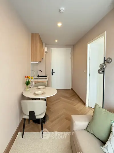 Modern compact living space with open kitchen and stylish decor