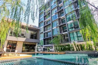 Modern condominium with pool and lush greenery, perfect for urban living.