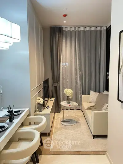 Modern living room with elegant decor and cozy seating area