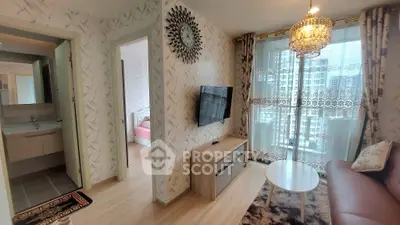 Modern living room with elegant decor and city view from balcony