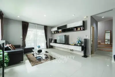 Spacious modern living room with sleek design and natural light
