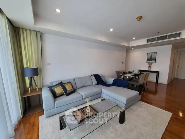 Spacious modern living room with elegant decor and natural light
