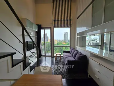 Modern living room with loft design and city view balcony