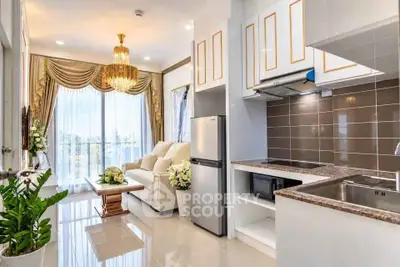 Luxurious open-plan living room and kitchen with elegant decor and natural light