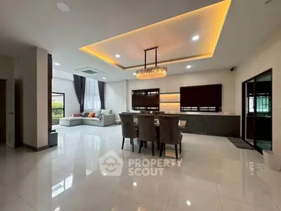 Spacious modern living room with elegant dining area and stylish lighting