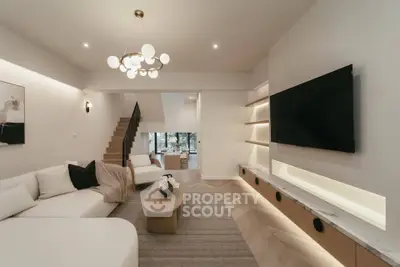 Luxurious modern living room with elegant lighting and stylish decor