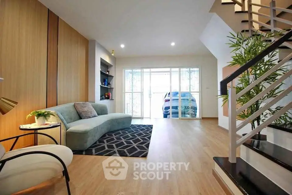 Spacious modern living room with elegant decor and natural light