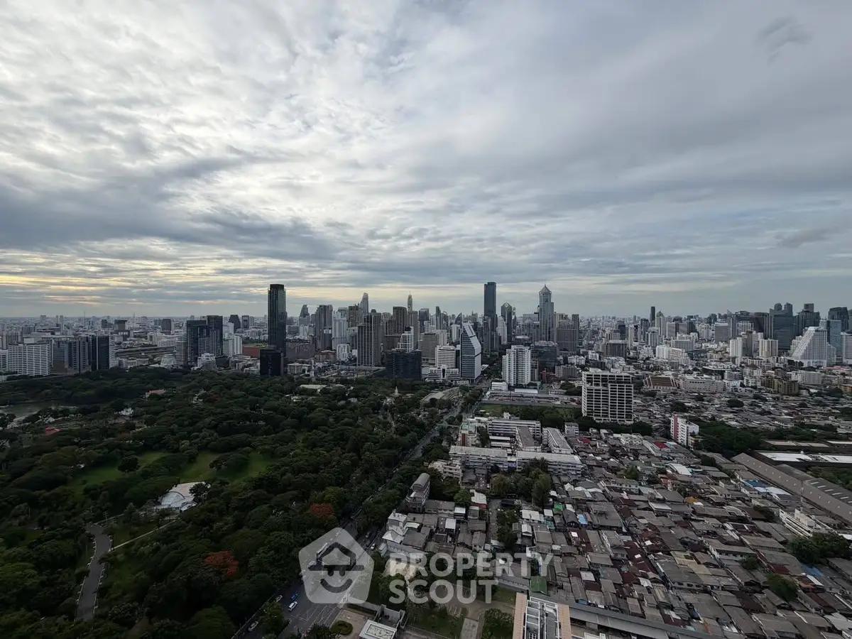 Stunning cityscape view showcasing a vibrant urban skyline with lush green park, perfect for real estate investment.