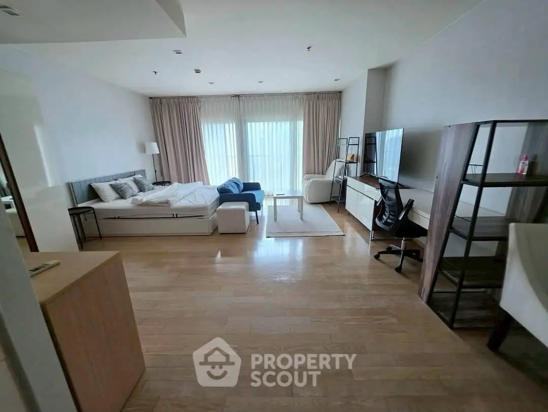 Spacious modern living room with stylish furniture and natural light