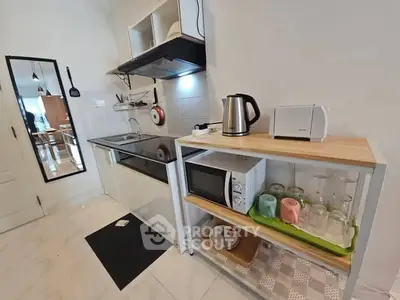 Modern kitchen with sleek appliances and minimalist design