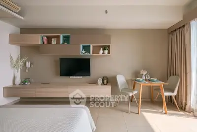 Modern living room with stylish furniture and natural light, perfect for cozy living.
