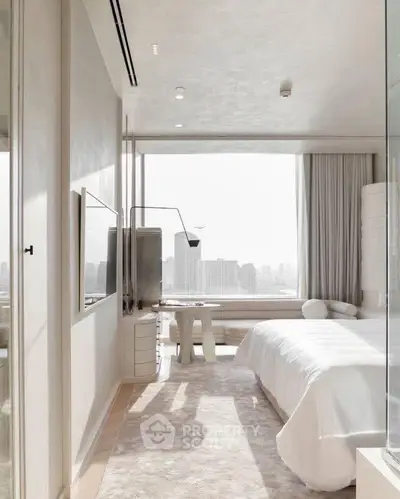 Luxurious modern bedroom with stunning city view and elegant decor.