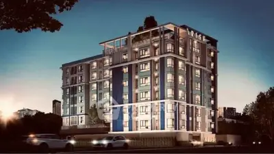 Modern multi-story residential building with sleek design and illuminated windows at dusk.