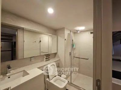 Modern bathroom with sleek design and spacious shower area
