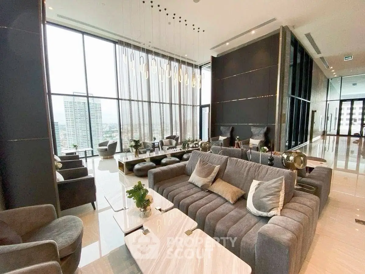 Luxurious modern living room with panoramic city views and elegant furnishings.