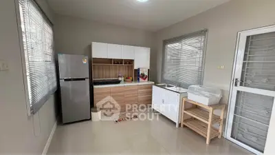 Modern kitchen with sleek cabinetry and stainless steel appliances