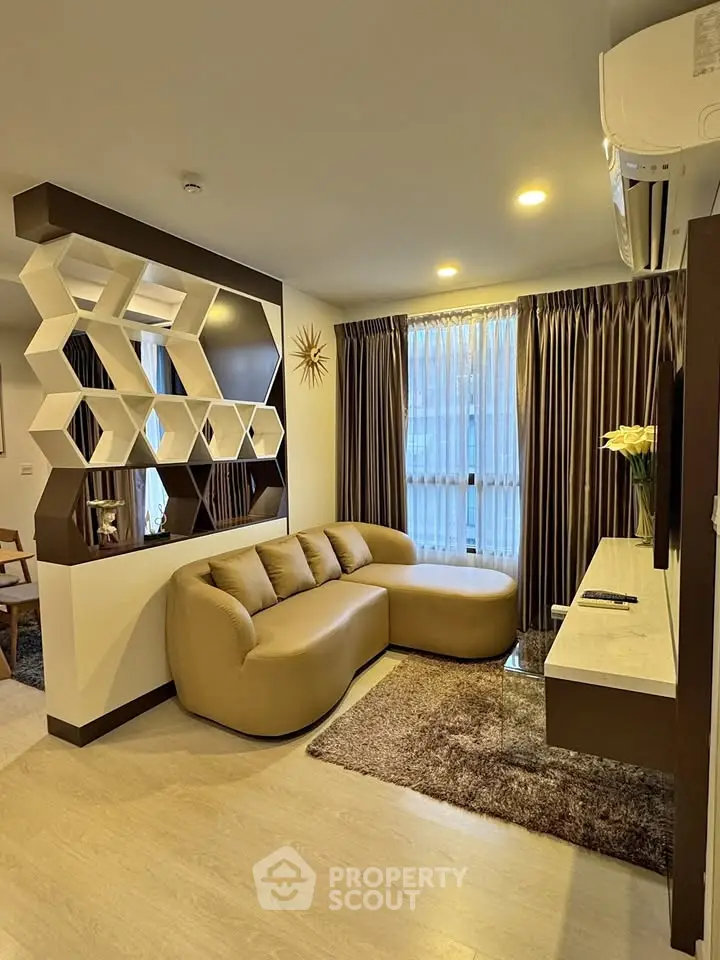 Modern living room with stylish decor and cozy seating area
