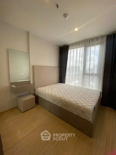 Modern bedroom with natural light and minimalist design