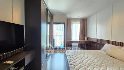 Modern bedroom with balcony view in high-rise apartment