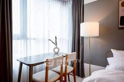 Chic modern bedroom with elegant decor and natural light