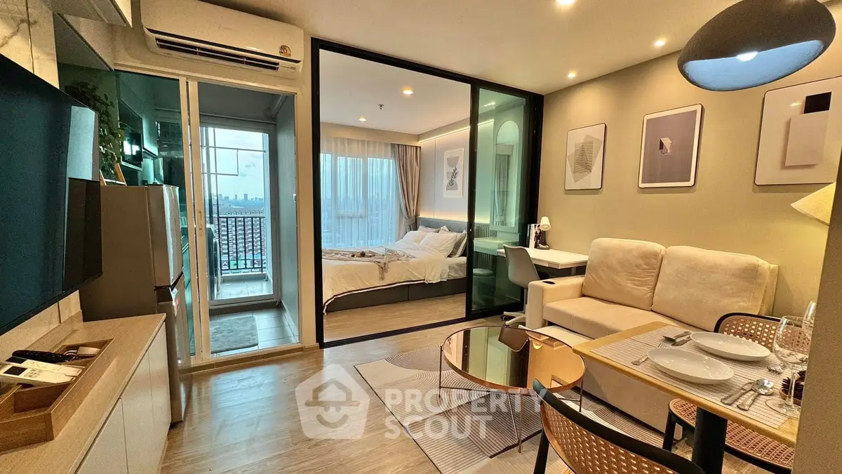Modern studio apartment with open layout, featuring cozy living area and stylish bedroom with city view.