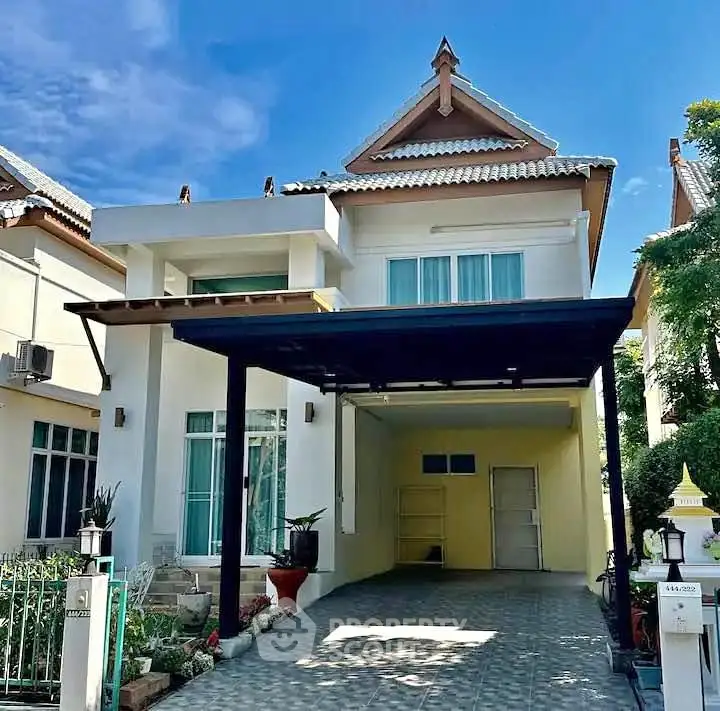 Charming modern house with traditional roof design and spacious carport