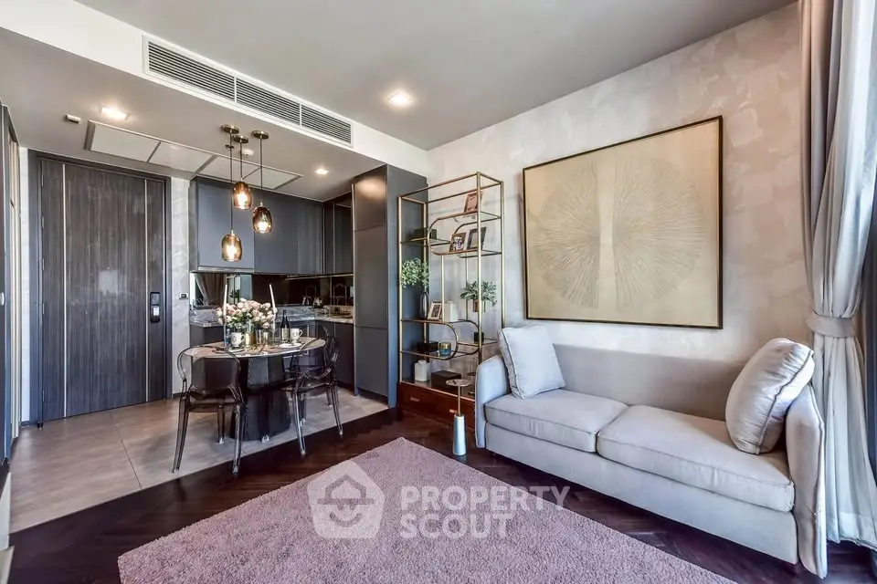 Modern living room with elegant decor and open kitchen layout