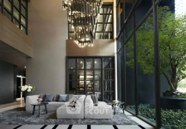 Luxurious modern living room with high ceilings and elegant chandelier