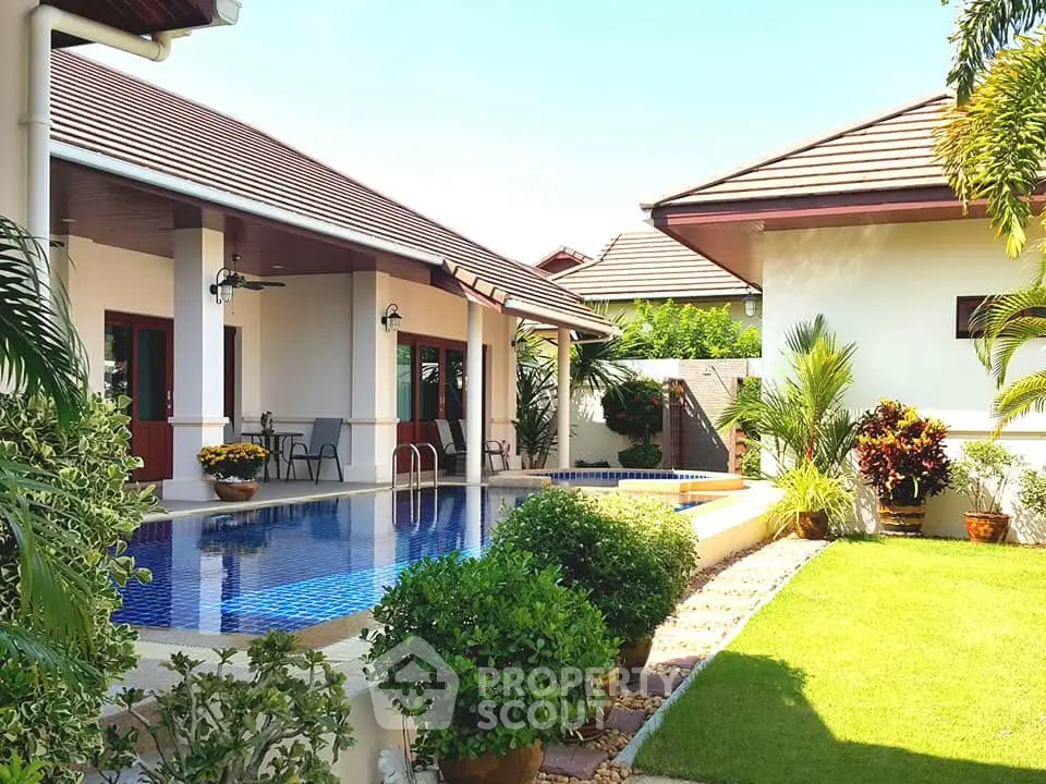 Luxurious villa with private pool and lush garden, perfect for relaxation and entertaining.