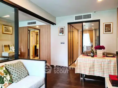 Modern living room with dining area in stylish apartment