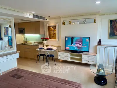 Luxurious studio apartment with modern kitchen and cozy living area, perfect for urban living.