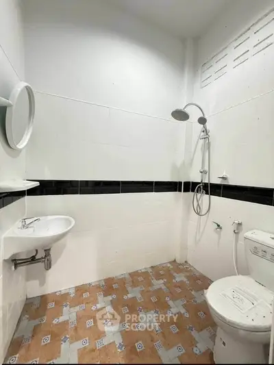 Modern minimalist bathroom with white tiles and shower