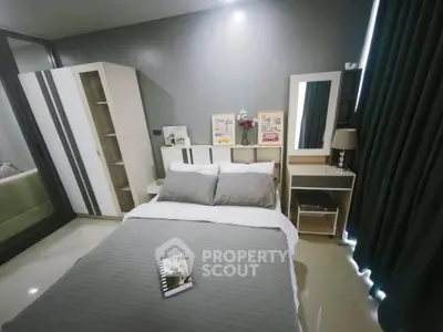Modern bedroom with stylish decor and ample storage space