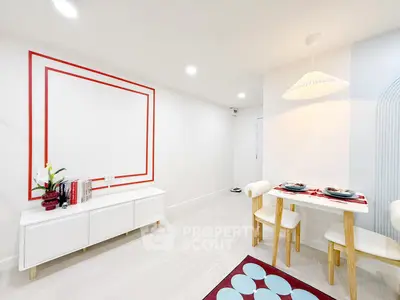 Modern minimalist dining area with stylish decor and bright lighting