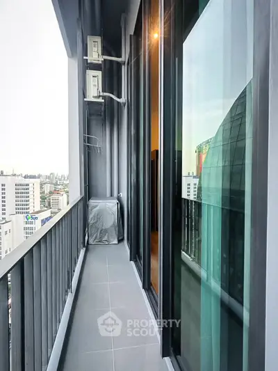Spacious balcony with city view in modern high-rise apartment