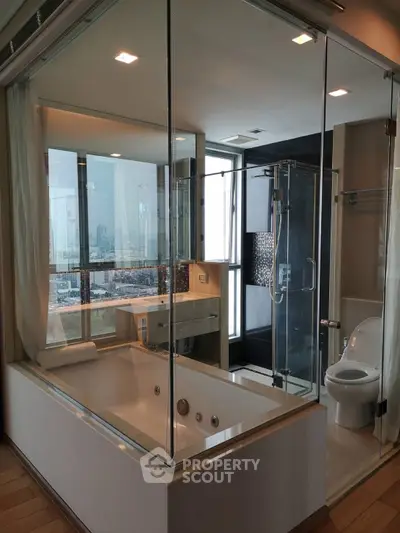 Luxurious modern bathroom with city view, featuring a glass-enclosed bathtub and sleek fixtures.