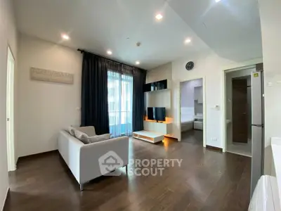 Modern living room with sleek design and cozy ambiance