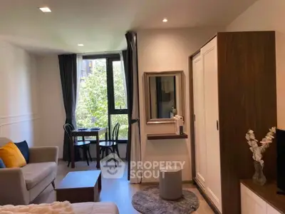 Cozy studio apartment with modern decor and natural light