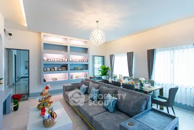 Luxurious living room with elegant decor and ample natural light