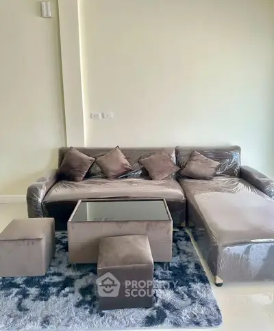 Modern living room with plush sofa and stylish decor