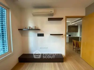 Modern interior with floating shelves and air conditioning in a stylish apartment